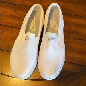 Nike white slip-on shoes